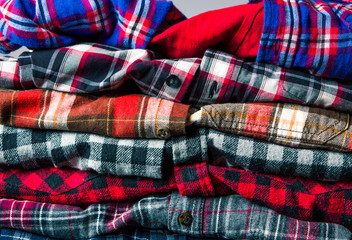 Colorful male shirts on a pile