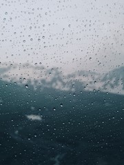 Rain in the mountains through Glass