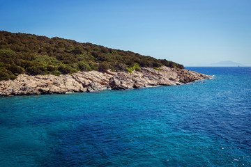 Turquoise water near beach on Aegean coast  sea Turkish resort, Bodrum, Turkey