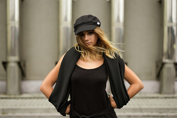 Fashion portrait of Positive fashion shine beautyful girl enjoy life. Portrait of beautiful caucasian woman with beautiful face walking outdoors. Copy space.