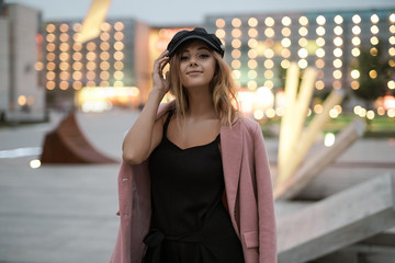 Fashion portrait of Positive fashion shine beautyful girl enjoy life. Portrait of beautiful caucasian woman with beautiful face walking outdoors. Copy space.