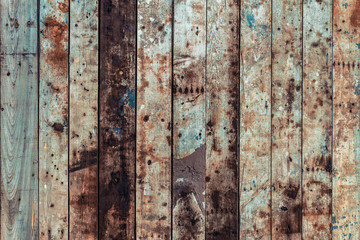 Wooden background of old weathered boards