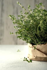 Spicy herb thyme in a paper bag