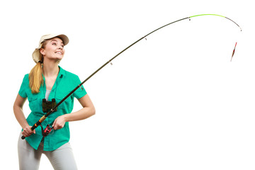 Obraz premium Woman with fishing rod, spinning equipment