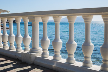 railing against the sea