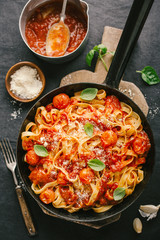 Tomato sauce spaghetti pasta on pan