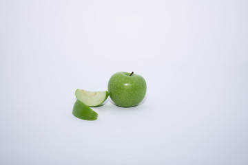 green apple and cut isolated
