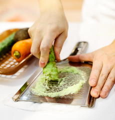Sushi chef grating fresh Wasabi, Fresh wasabi root prepare for nigiri sushi