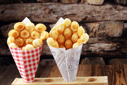 Hong Kong Style Egg Waffle On Wooden Board. Bubble Waffle