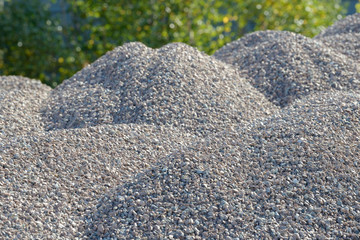 Breakstone background. Road gravel. Gravel texture. Crushed Gravel background. Piles of limestone rocks. Break stones on construction site.