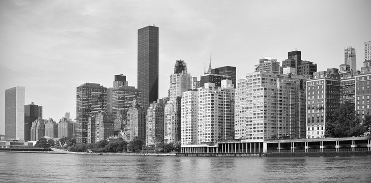 Fototapeta Black and white panorama of Midtown New York City waterfront, USA.