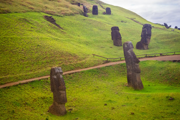 Rano Raraku volcano, the quarry of the moai with many uncompleted statues. Rapa Nui National Park, Easter Island, Chile. UNESCO World Heritage Site