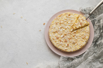 Homemade swedish almond cake, fluffy egg whites in the base and rich egg yolks in the custard topping. gluten free