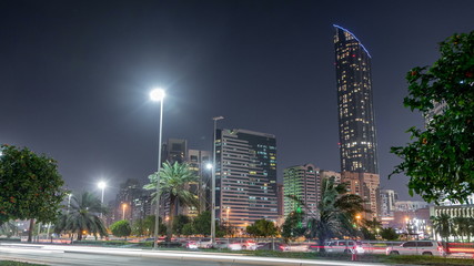 Skyscrapers in Abu Dhabi Skyline at night timelapse, United Arab Emirates