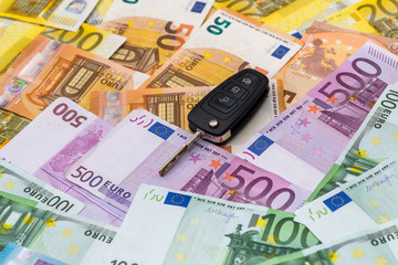 Remote car control on euro banknotes background