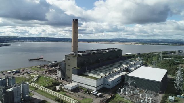 Aerial footage of Longannet power station on the north coast of the Firth of Forth in Scotland, near Kincardine. Now disused and in the process of being demolished.