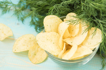Potato chips with spicy in a glass bowl