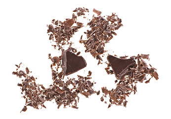 Crushed chocolate shavings isolated on white background. Top view.