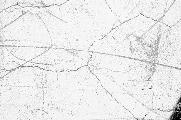 Fototapeta premium Wall fragment with scratches and cracks. It can be used as a background