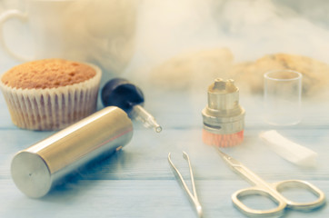 Still life with e-ciggarete and coffe on the wooden background