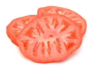 Three tomato slices over a white background