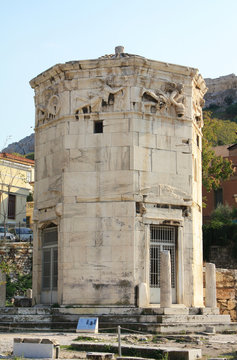 Ancient Tower of the Winds (Horologion or Aerides) in Athens, Greece. It served as a compass, sundial, wetaher vane and water clock. Each face of the frieze is adorned with a relief of one of the god 