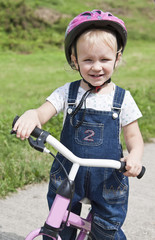 Obraz premium girl riding a bike