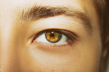 A beautiful insightful look man's eye. Close up shot.