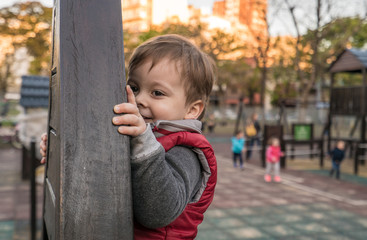 baby boy in a park at the playground