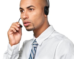 Portrait of a man with headset working as a call center operator