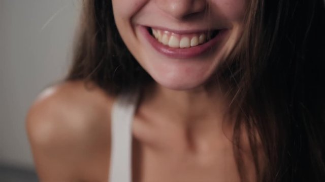 Woman smiling with perfect smile and white teeth laughing smile