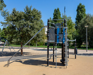 Children Playground on a Sunny Day Near Some Trees