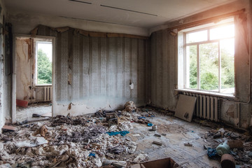 Interior of domestic room of abandoned forsaken apartment house