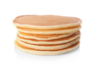 Stack of hot tasty pancakes on white background