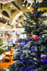 Photo of decorated Christmas tree in store