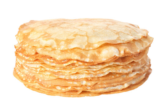 Stack of tasty thin pancakes on white background