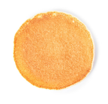 Hot tasty pancake on white background, top view