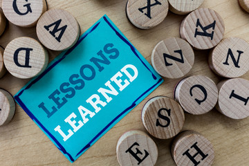 Writing note showing Lessons Learned. Business photo showcasing Promote share and use knowledge derived from experience.