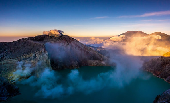 Crater with acidic crater lake Kawah Ijen the famous tourist attraction, where sulfur is mined. Aerial view of Ijen volcano complex is a group of stratovolcanoes in the Banyuwangi Regency of East Java