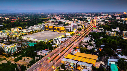 CHIANG MAI, THAILAND- AUGUST 7, 2018 : Top view aerial photo of Chiang Mai City with buildings, transportation.