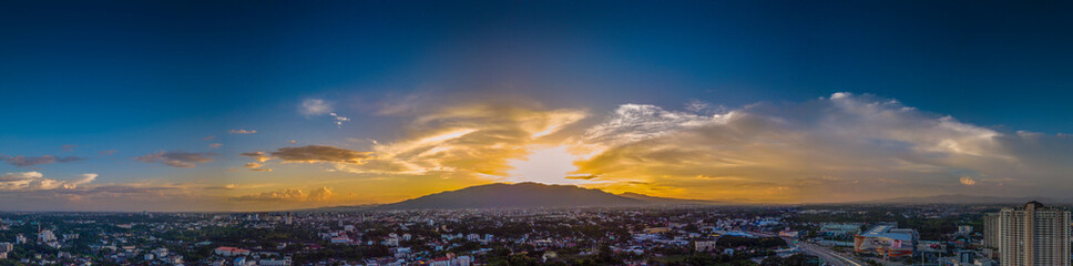 CHIANG MAI, THAILAND- AUGUST 7, 2018 : Aerial Panorama View of Chiang Mai City with sunset and twilight sky..