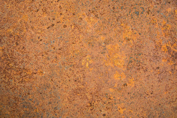 Brown rust stains texture of the old white paint on rusty metal wall. Rusty metal background.