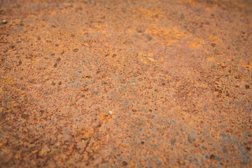 Brown rust stains texture of the old white paint on rusty metal wall. Rusty metal background.