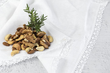 Fototapeta na wymiar Assortment of nuts. On a light background.