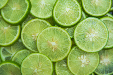 Citrus fruit of lime slices background
