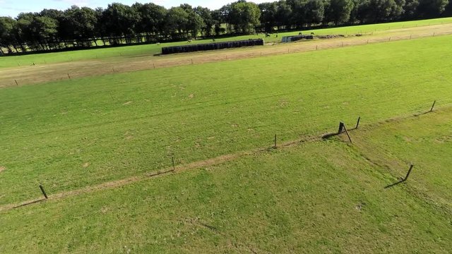 Aerial footage of green meadows.