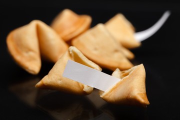 Broken Fortune Cookie with Blank Piece of Paper