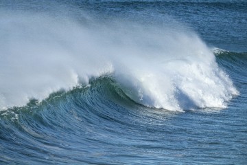 waves crashing in the ocean