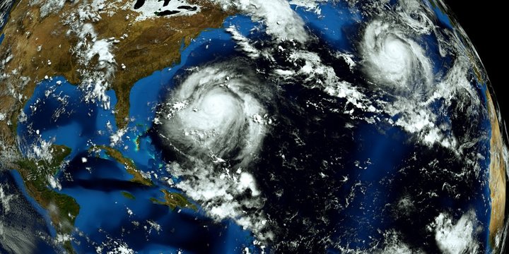 Extremely detailed and realistic high resolution 3D illustration of 2 hurricanes approaching the USA. Shot from Space. Elements of this image are furnished by Nasa.