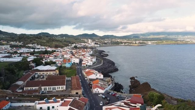 Flying over Ponta Delgada coast, San Miguel island, Azores, Portugal.